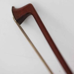 Old violin bow stamped C. Thomassin a Paris